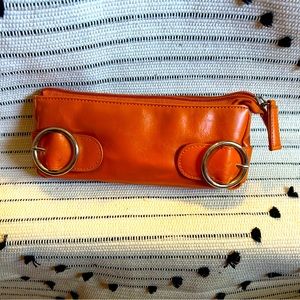 Stunning orange vintage faux leather Nordstrom clutch, bold silver hardware.
